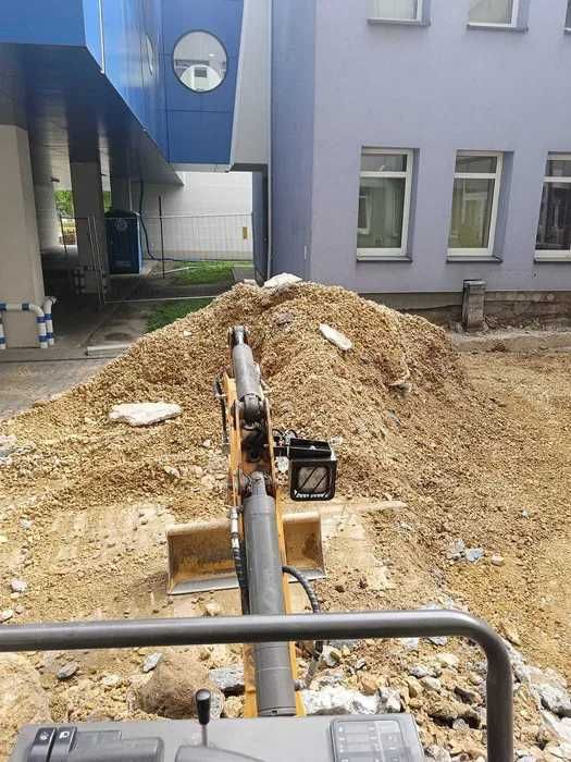wynajem mini koparki z operatorem płoty szamba kostki brukowa