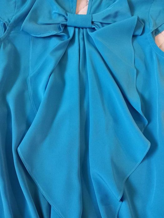 Wyjątkowa niebieska bluzka River Island – rozmiar 6