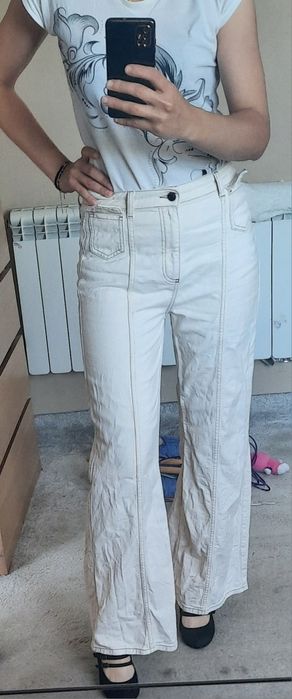 Jeansy reserved spodnie na lato jeansy flare jeansy wide leg szeroką nogawka brązowe przeszycia