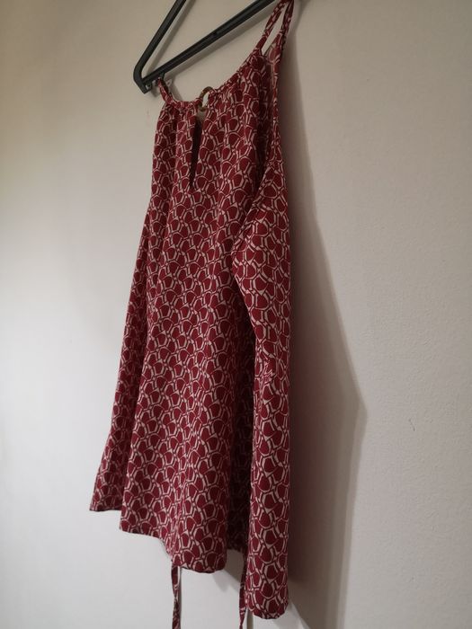 Túnica, tamanho L. Nova.