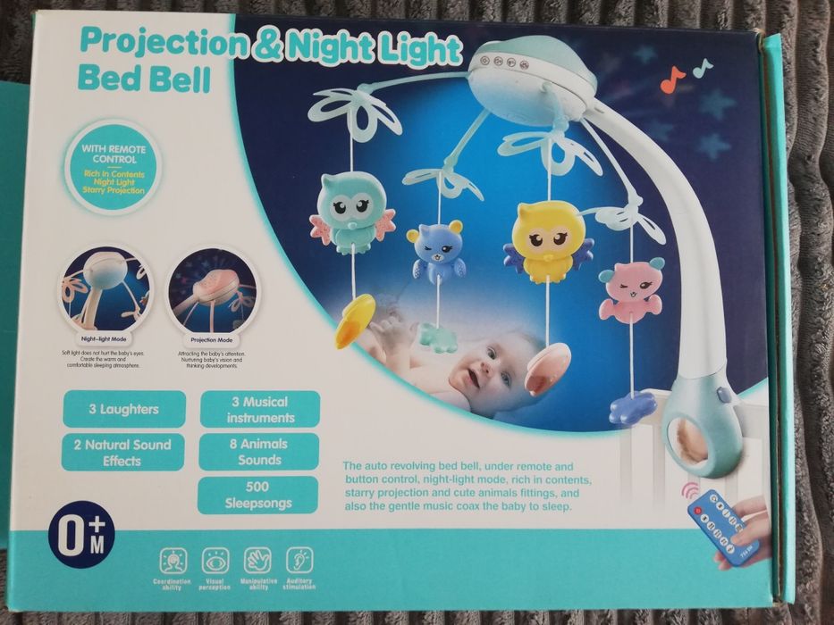 karuzela do łóżeczka z projektorem i muzyką