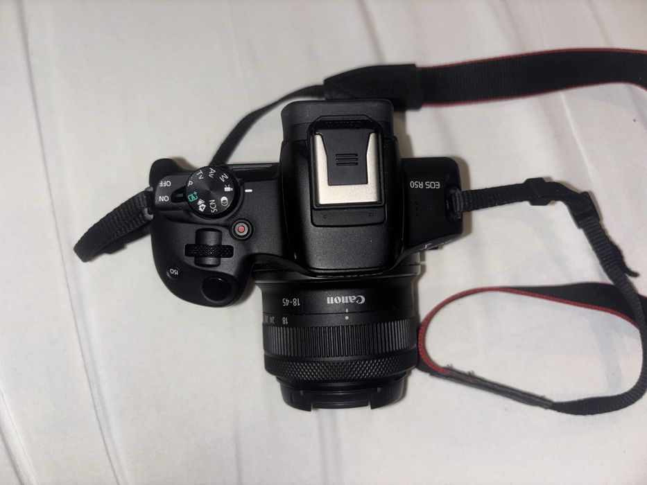 ítulo: Canon EOS R50 como nova + lente 18–45mm – 680€