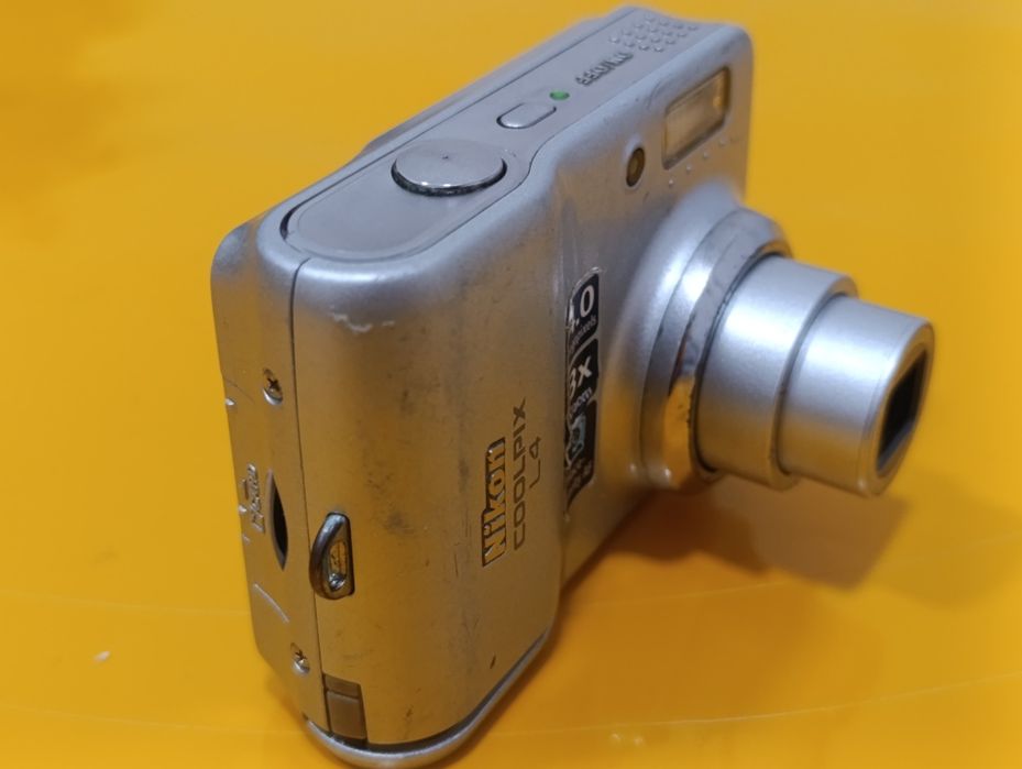 Aparat cyfrowy kompaktowy Nikon Coolpix  L4, na baterie AA, 99% OK