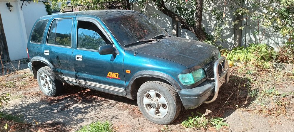 Внедорожник kia sporteg (рамная)  полноприводная
