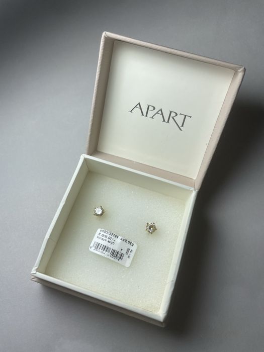 Złote kolczyki Apart