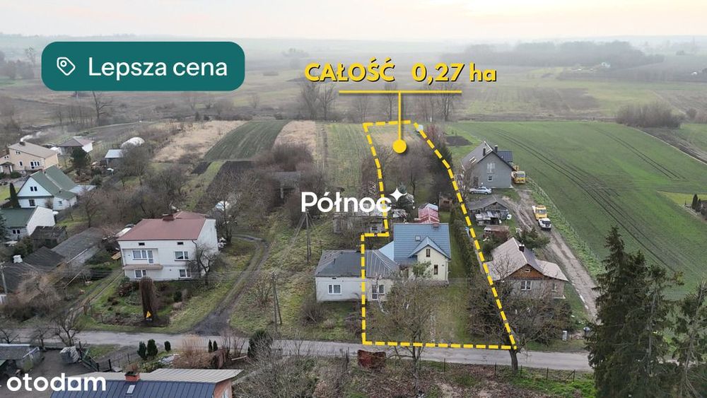 Dom przy spokojnej ulicy, nad rzeką.