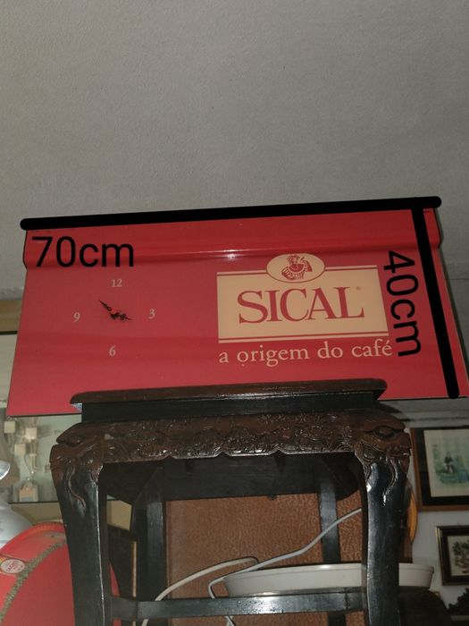 Letreiro e relógio SICAL