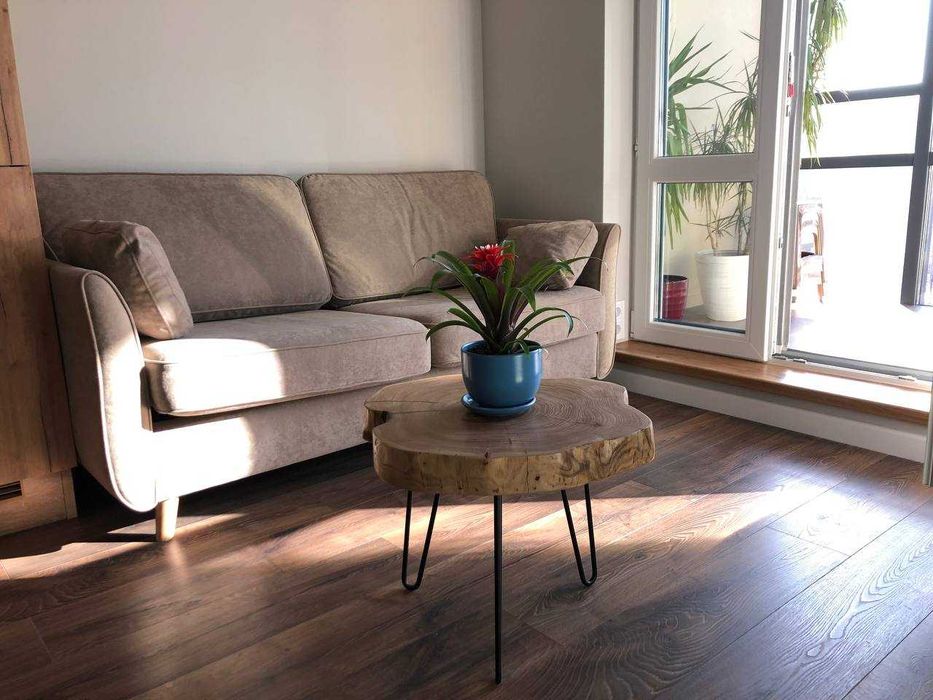 Mesa de centro de rodela de madeira.