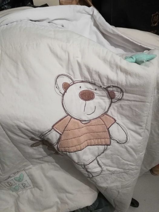 Colcha e cesto cosmética