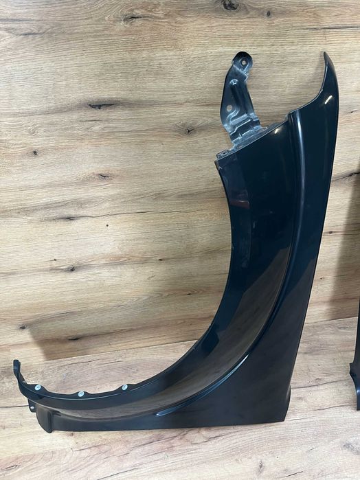 Błotnik przedni lewy prawy Nissan Navara kolor k26