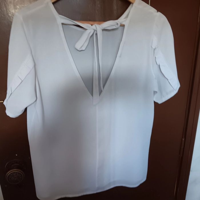 Diversas blusas para senhora