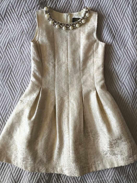 Золота сукня на 134 см