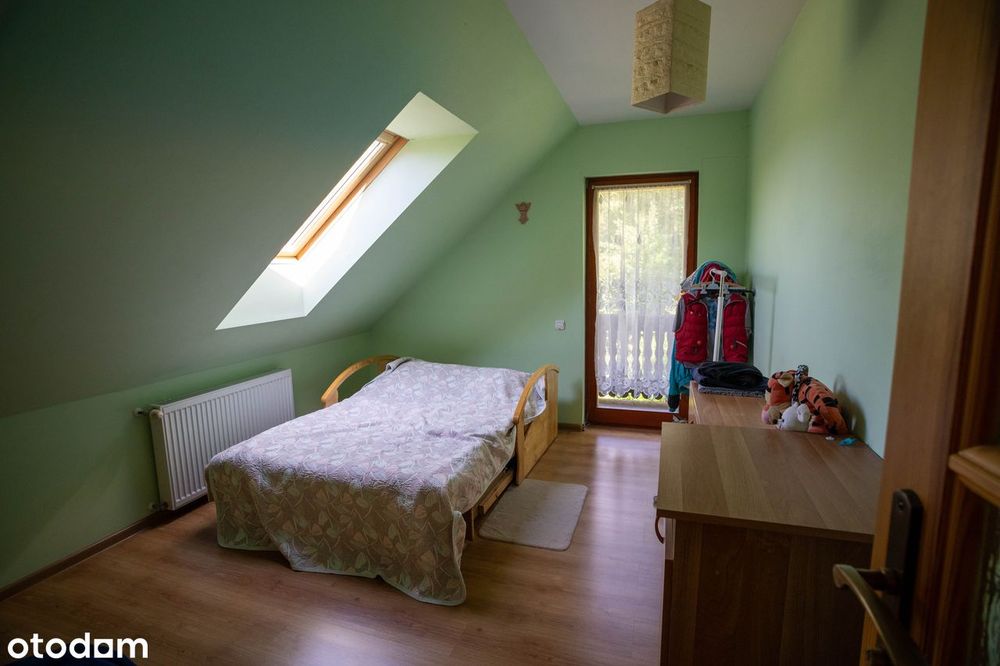 Działka inwestycyjna z domem i lasem