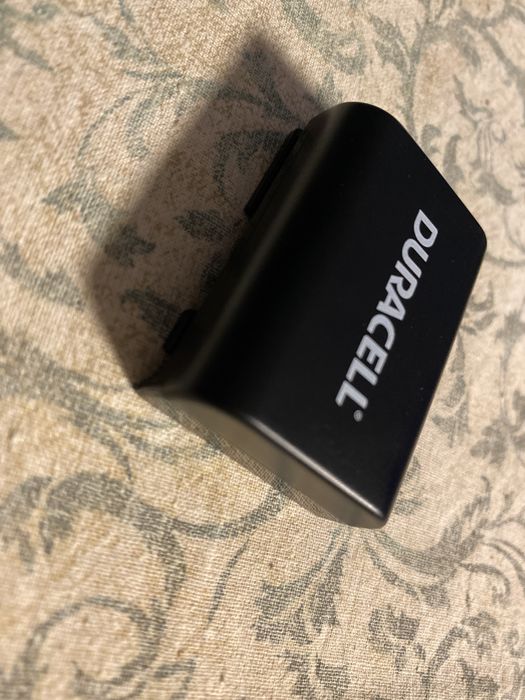 Carregador e bateria nova para câmara Canon