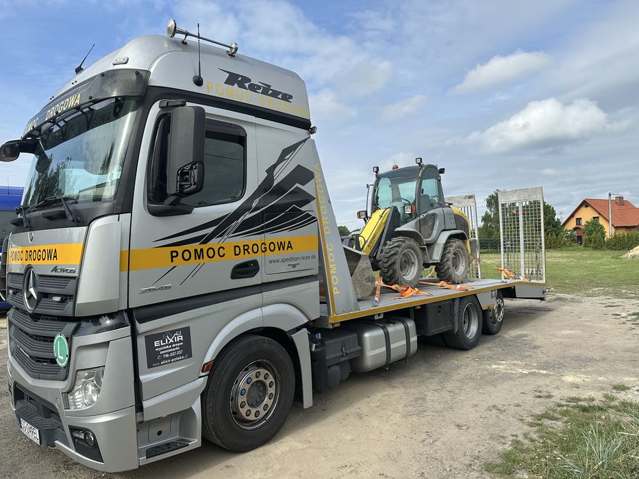 Pomoc drogowa Katowice Laweta 24 Transport maszyn i koparek slask