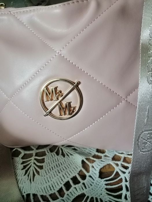 Listonoszka pudrowy roż