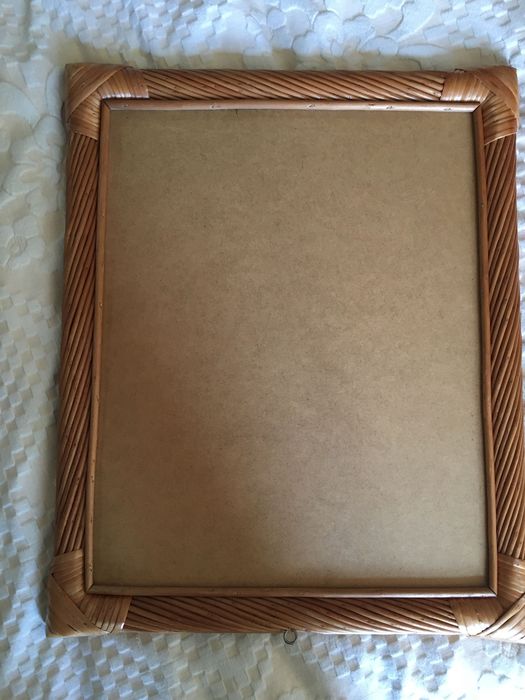 Espelho com moldura em verga