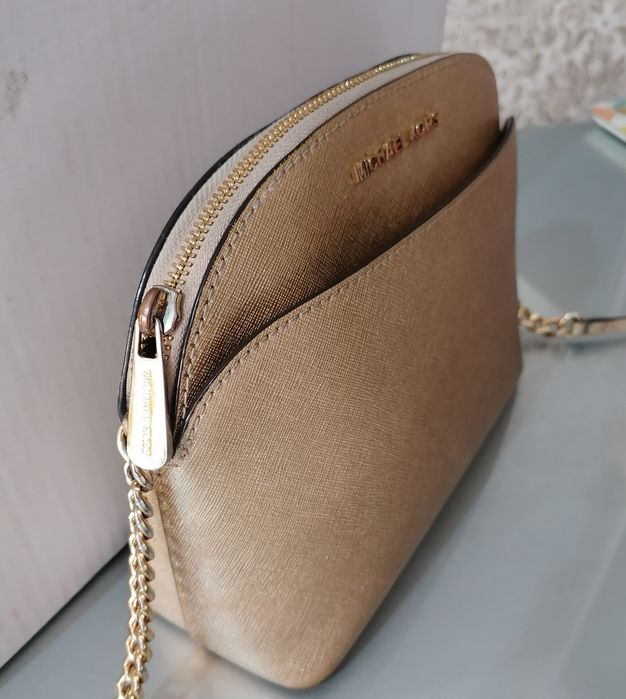 Mala Michael Kors dourada