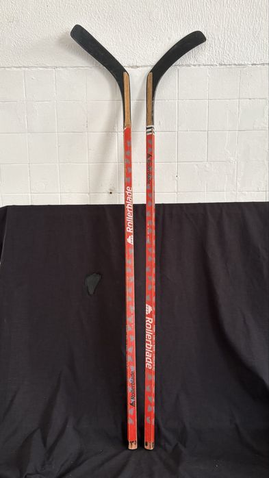 2 sticks de hochey de patins em linha