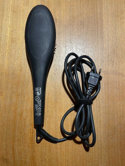 Escova de alisamento usada