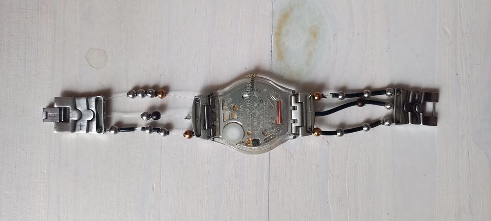 Часы swatch ультраплоские