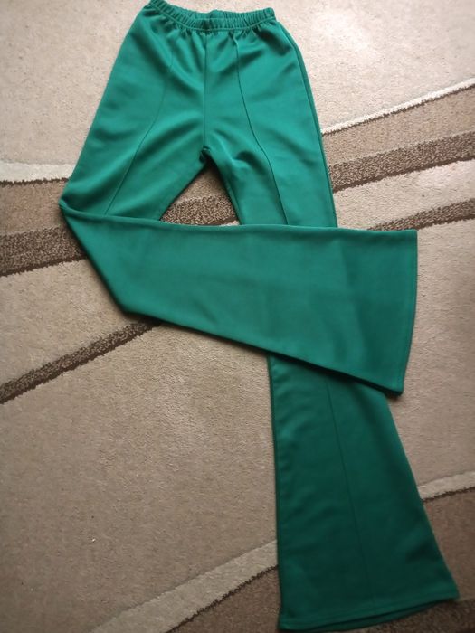Зелені брюки кльош.штани зелені
