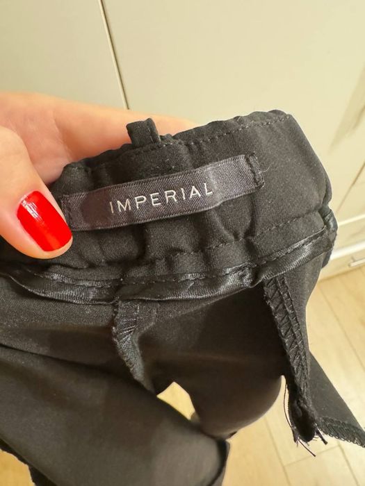 Женские брюки Imperial черного цвета , размера S