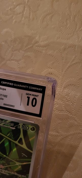 Graded slabs CGC 10 Destined Rivals Team Rocket's Illustration Rare