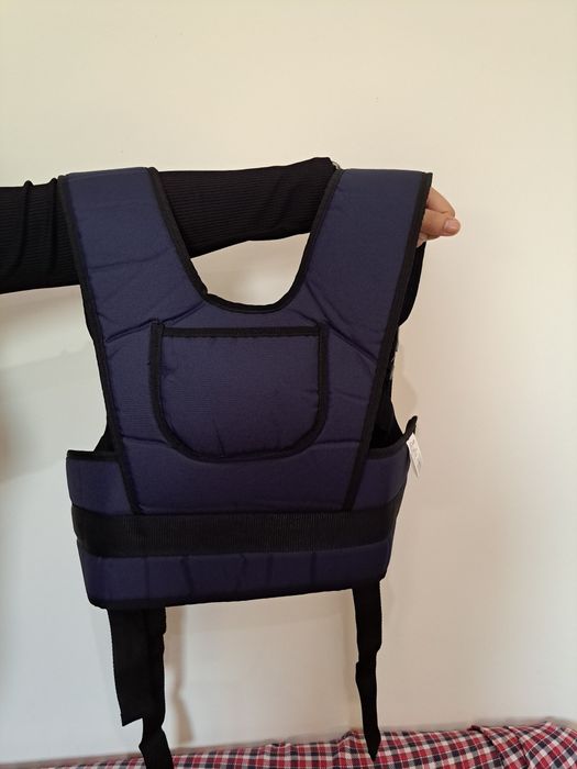 Colete para cadeira de rodas