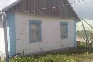 Продається ділянка  с будинком під  знесення