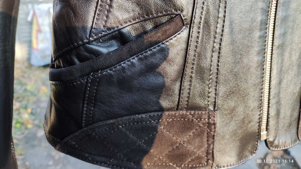 Новая кожанная женская, коричневая  курточка