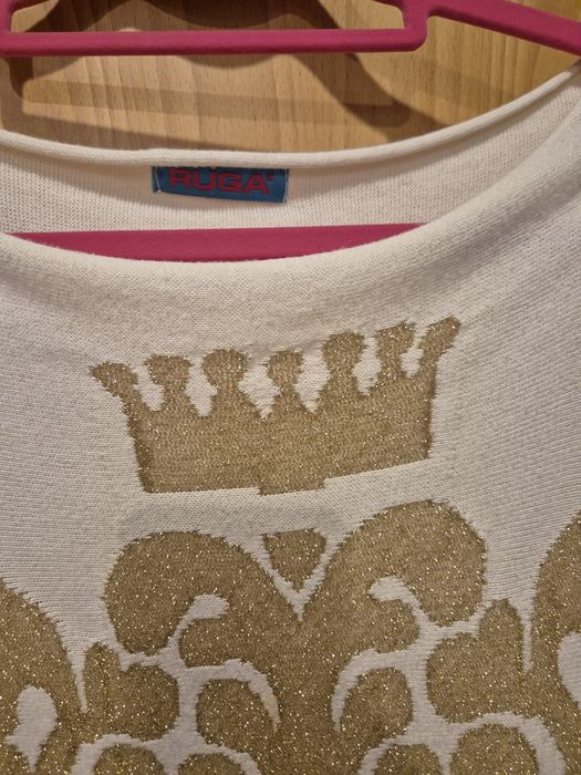 Camisola creme e dourada, da marca RUGA