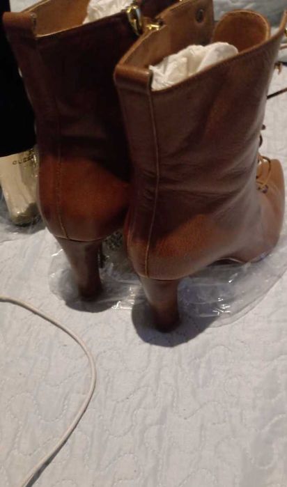 Super Promoção,70 porcento de desconto,lindas botas compre agora.