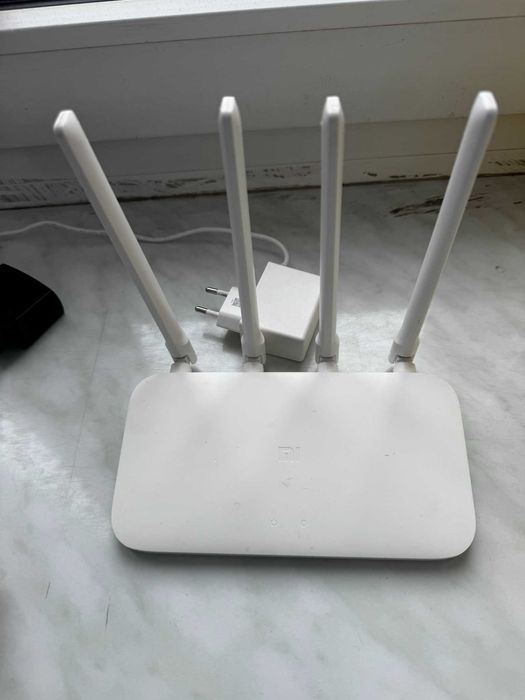 Роутери TP-Link TL-WR840N та Xiaomi Mi 4A R4AC WiFi 5G