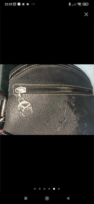 Mala tiracolo em pele