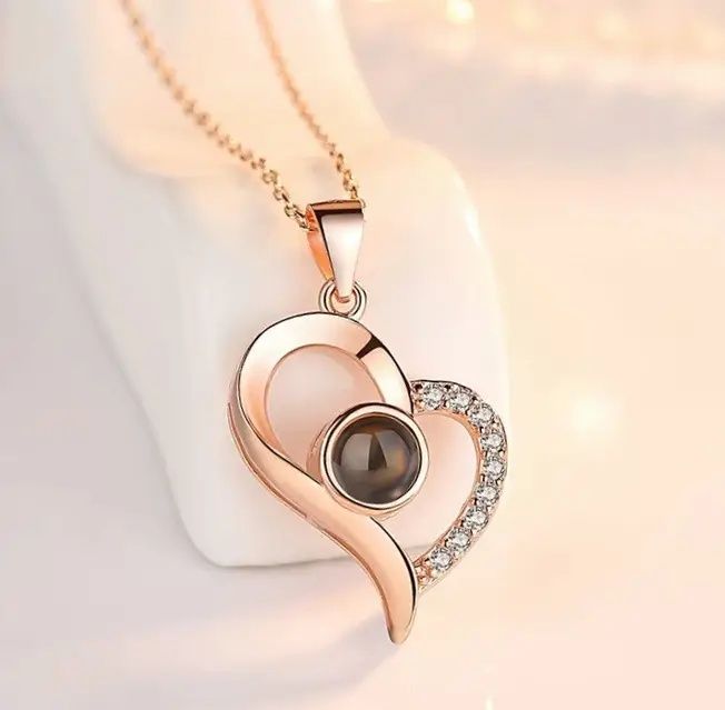 Оригінальний подарунок дівчині - кулон "Золоте серце з кристалом освід
