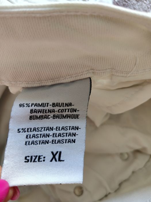 Spodnie białe  jeansowe  dżinsy z rozdarciami ,duże dziury wysoki stan