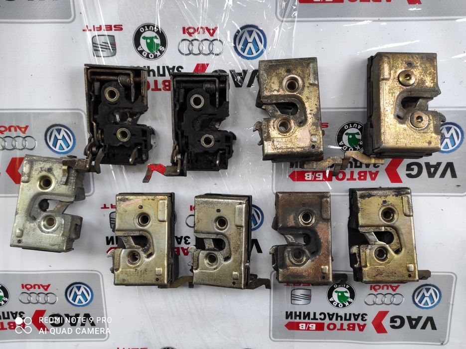 Замок дверний б/в оригінал VAG VW Т-4,Пассат Б3,Б4,Гольф ,Поло,Сеат