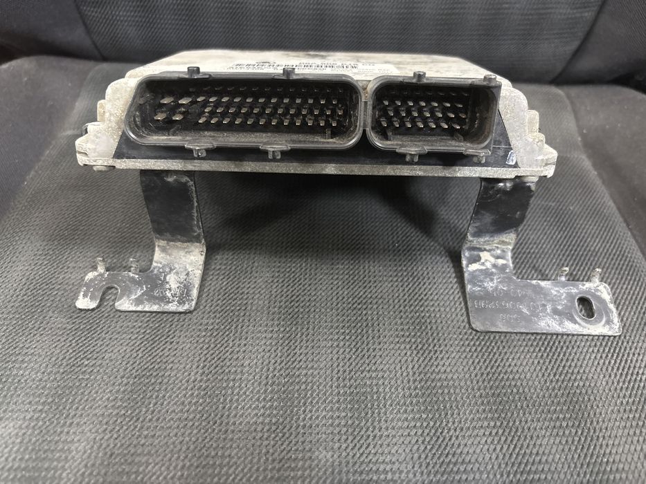 Блок керування двигуном Skoda Octavia 1,6 AKL 06A906019CQ, 5WP4458