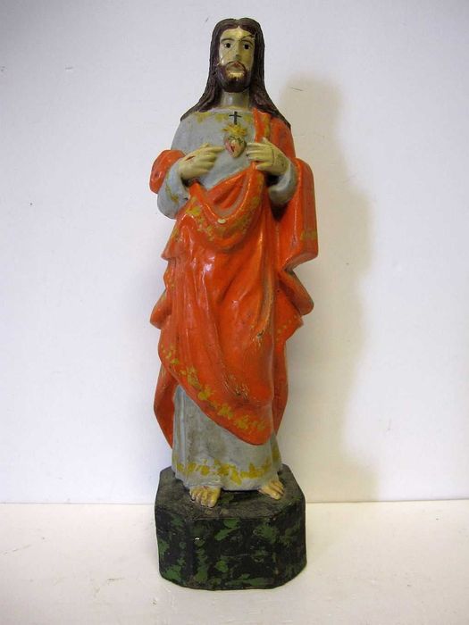 Ancient polychrome clay figure of the Sacred Heart of Jesus