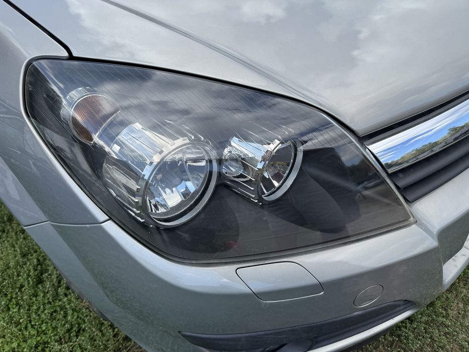Lampa  przód reflektor Astra H 3 H7 prawa