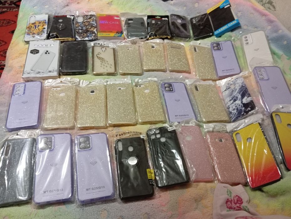 Мега лот чехлов -книжка и бамперов на разные модели телефона.