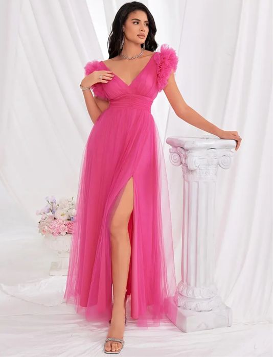 Розкішна вечірня сукня у яскраво-рожевому кольорі