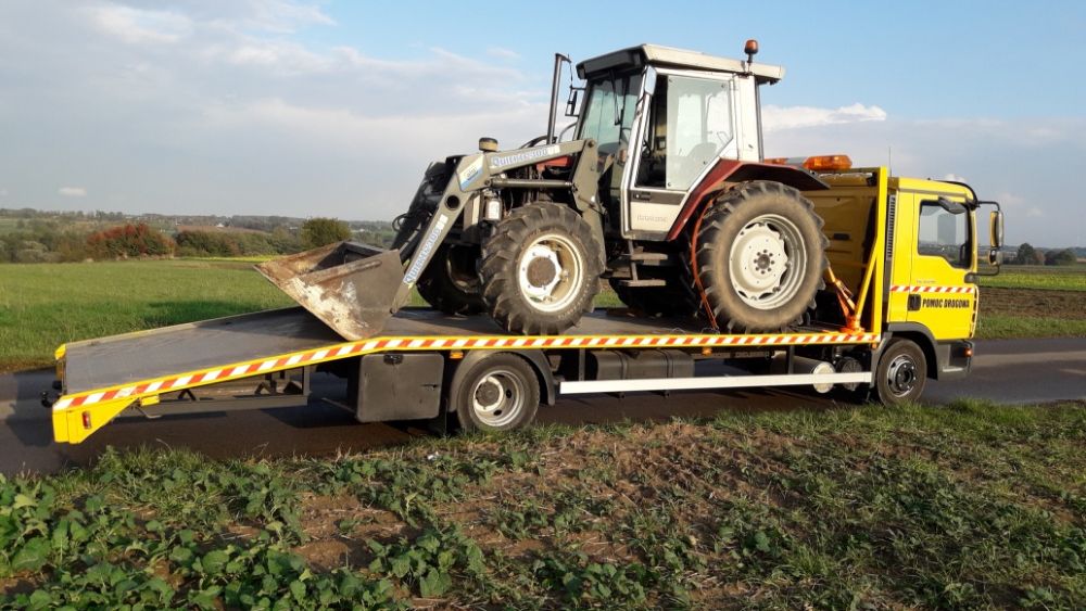 Pomoc drogowa, przewóz transport maszyn, ciągników, Laweta