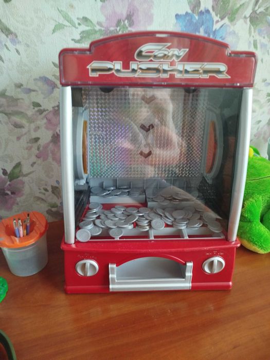 Штовхав монет ігровий автомат