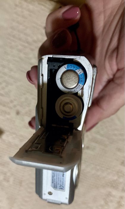 Máquina fotográfica Rollei com capa