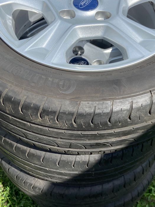 Alufelgi orginalne Ford 15-4x108 z oponami letnimi continental
