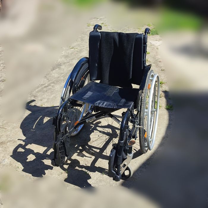 Wòzek inwalidzki QUICKIE