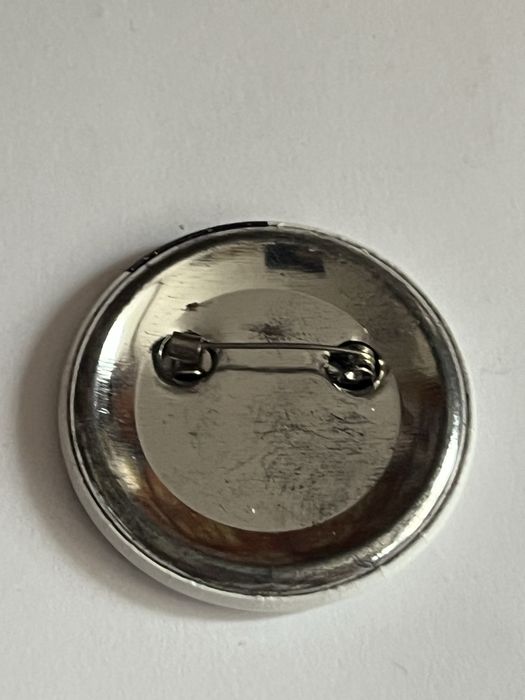 Ozdobna przypinka sklepu House