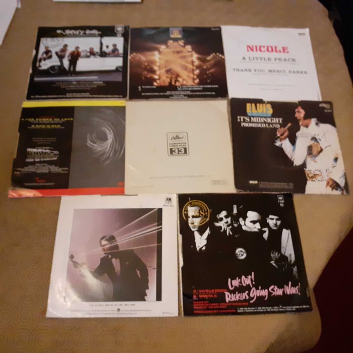 Singles-Chris De Burgh, Elvis, The Mission e outros